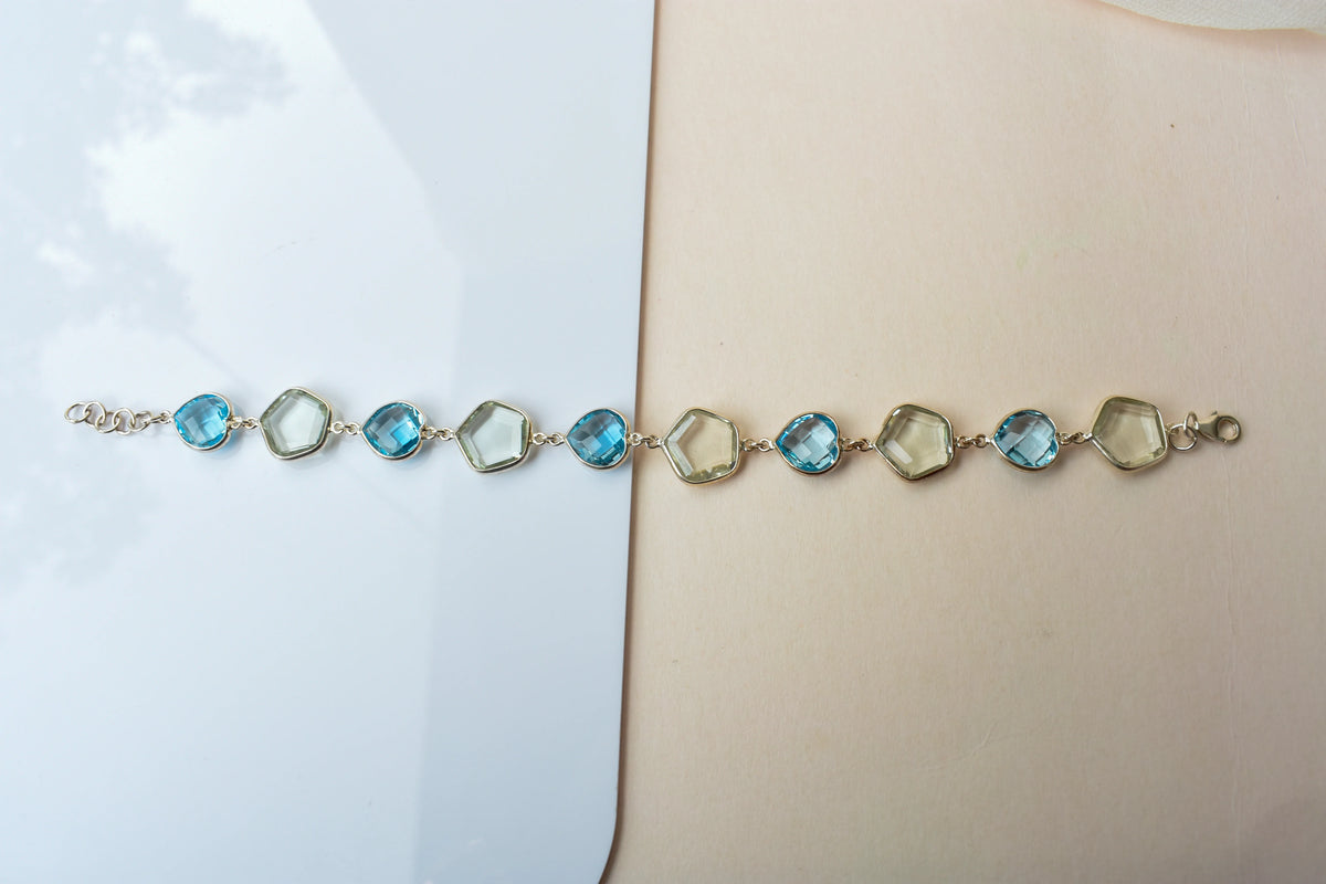 Green amethyst and sky blue topaz bezel bracelet in 925 silver