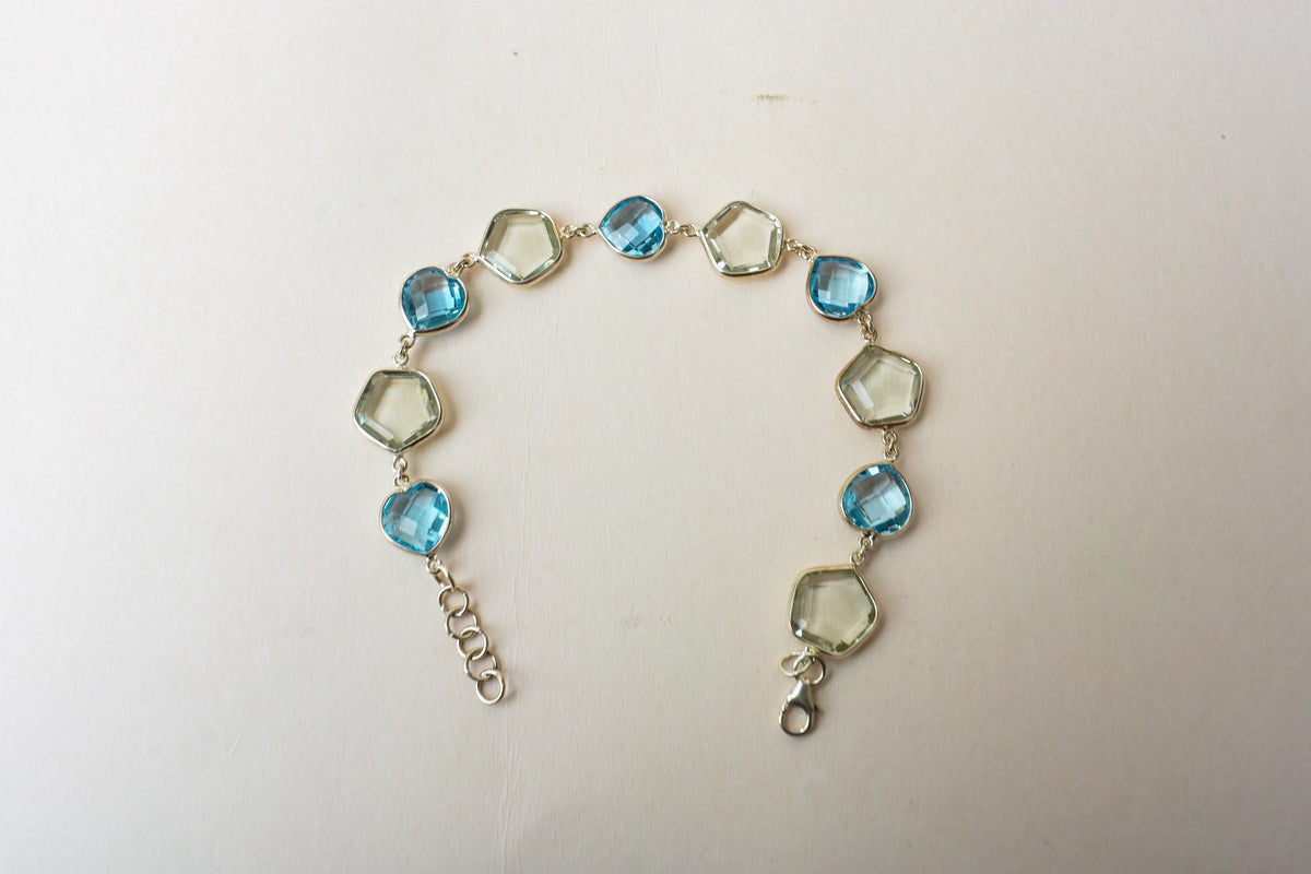 Green amethyst and sky blue topaz bezel bracelet in 925 silver