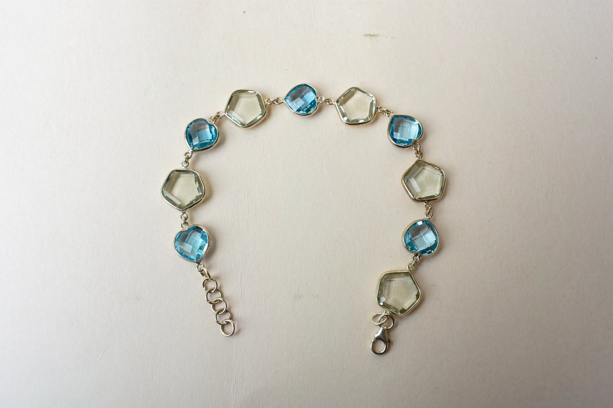 Green amethyst and sky blue topaz bezel bracelet in 925 silver