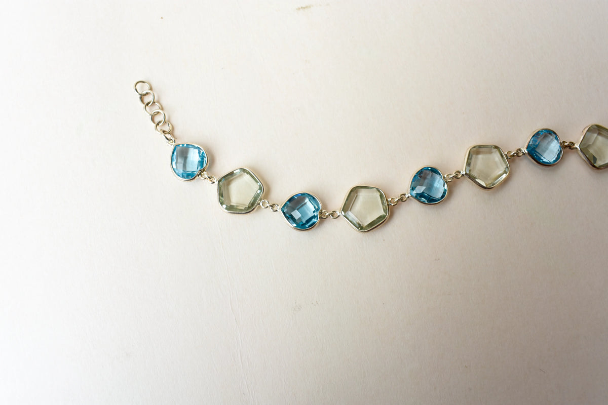 Green amethyst and sky blue topaz bezel bracelet in 925 silver