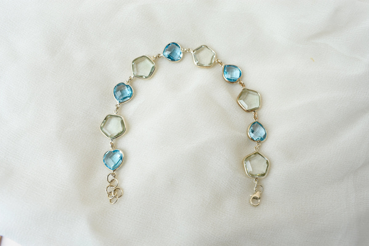 Green amethyst and sky blue topaz bezel bracelet in 925 silver