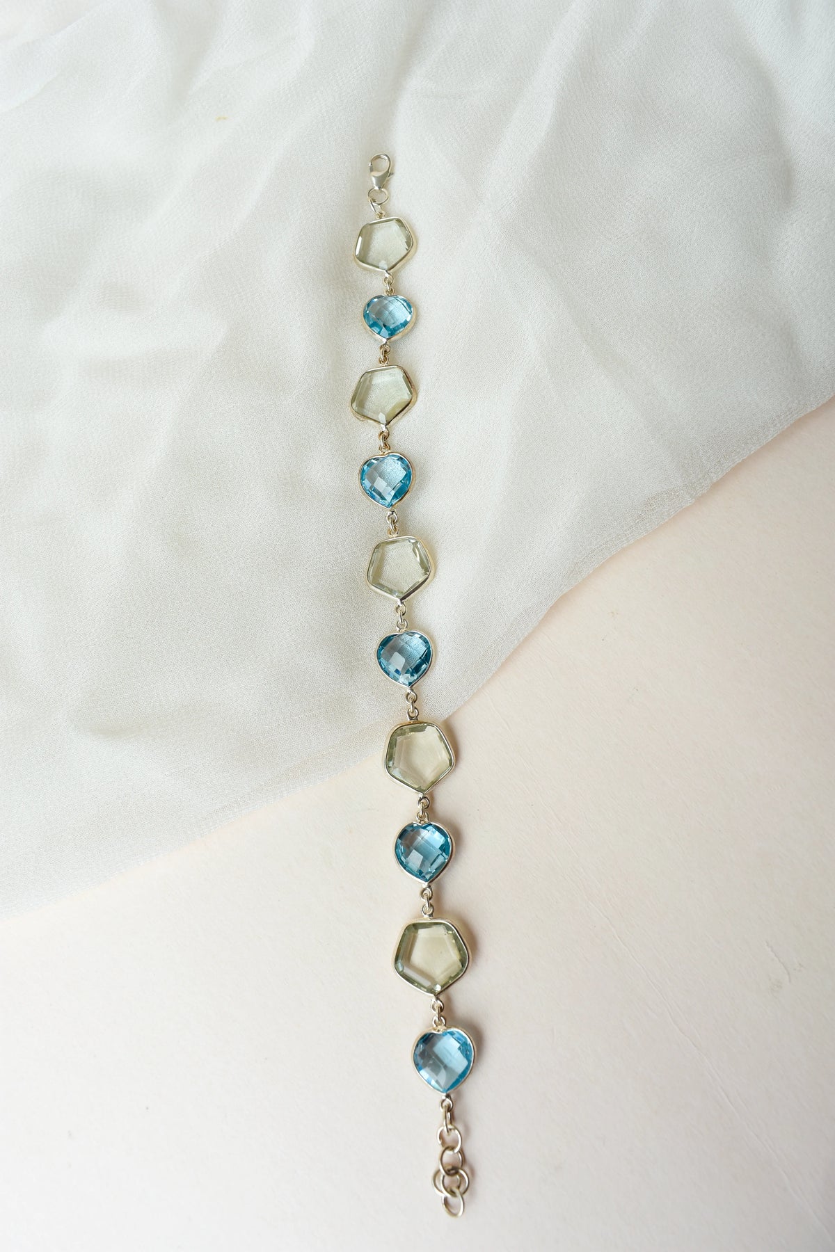 Green amethyst and sky blue topaz bezel bracelet in 925 silver