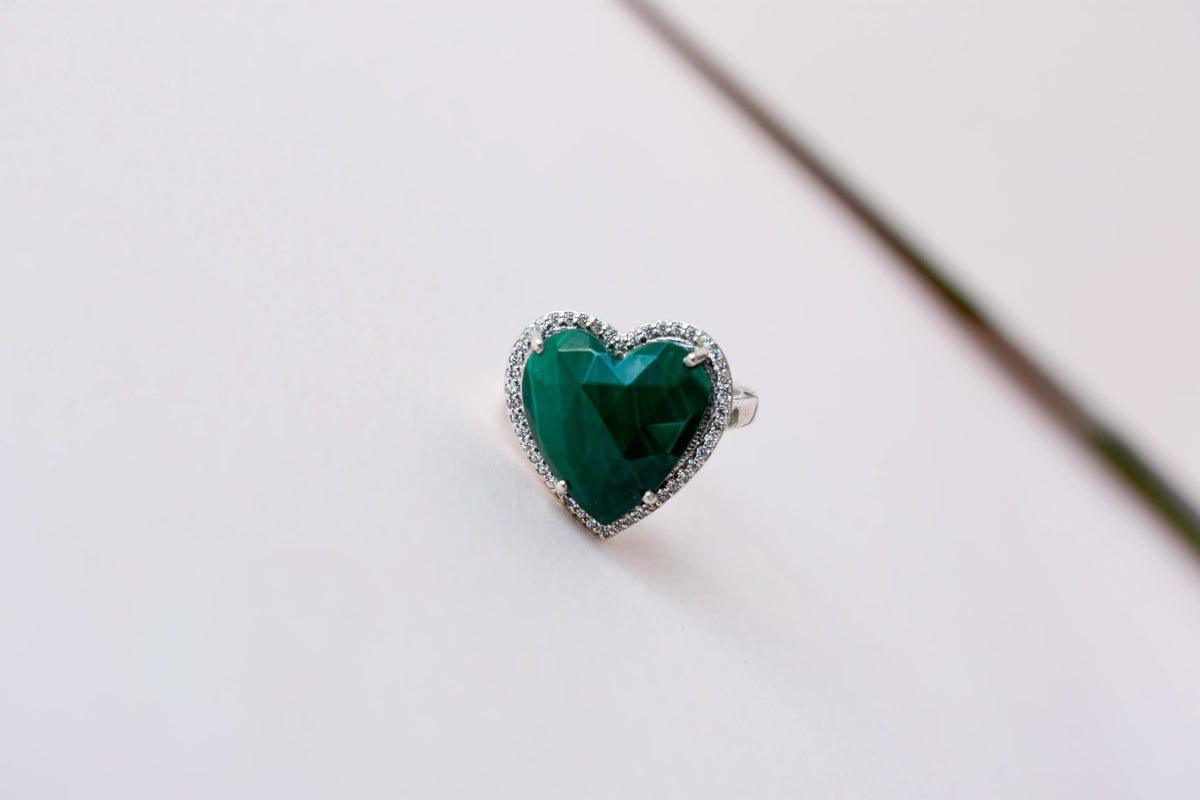 Heart-cut malachite ring in 925 silver with cubic zirconia halo
