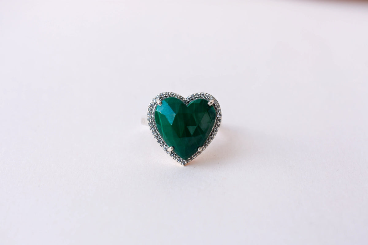 Heart-cut malachite ring in 925 silver with cubic zirconia halo