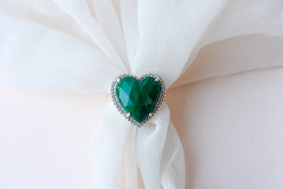 Heart-cut malachite ring in 925 silver with cubic zirconia halo