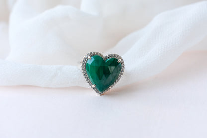 Heart-cut malachite ring in 925 silver with cubic zirconia halo