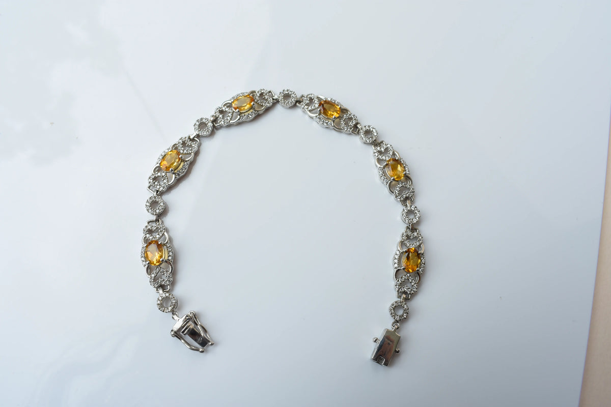 Citrine and cubic zirconia halo bracelet in 925 silver