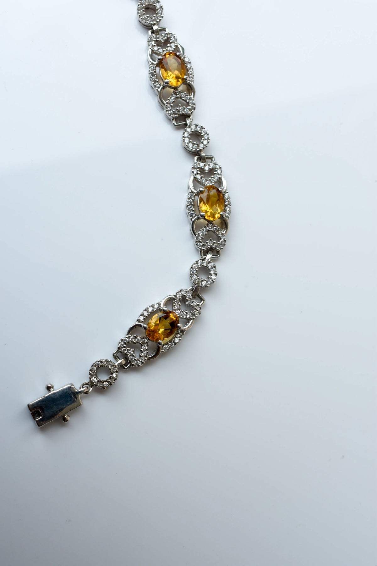 Citrine and cubic zirconia halo bracelet in 925 silver