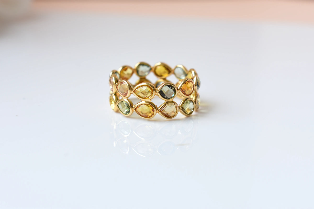 Pear-cut multicolor sapphire woven eternity ring in 18K gold, gold and citrine tones