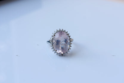 Oval rose quartz halo ring in 925 silver with cubic zirconia accents