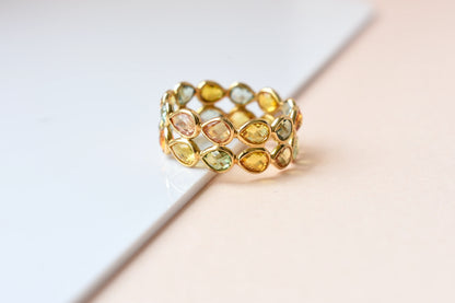 Pear-cut multicolor sapphire woven eternity ring in 18K gold, gold and citrine tones