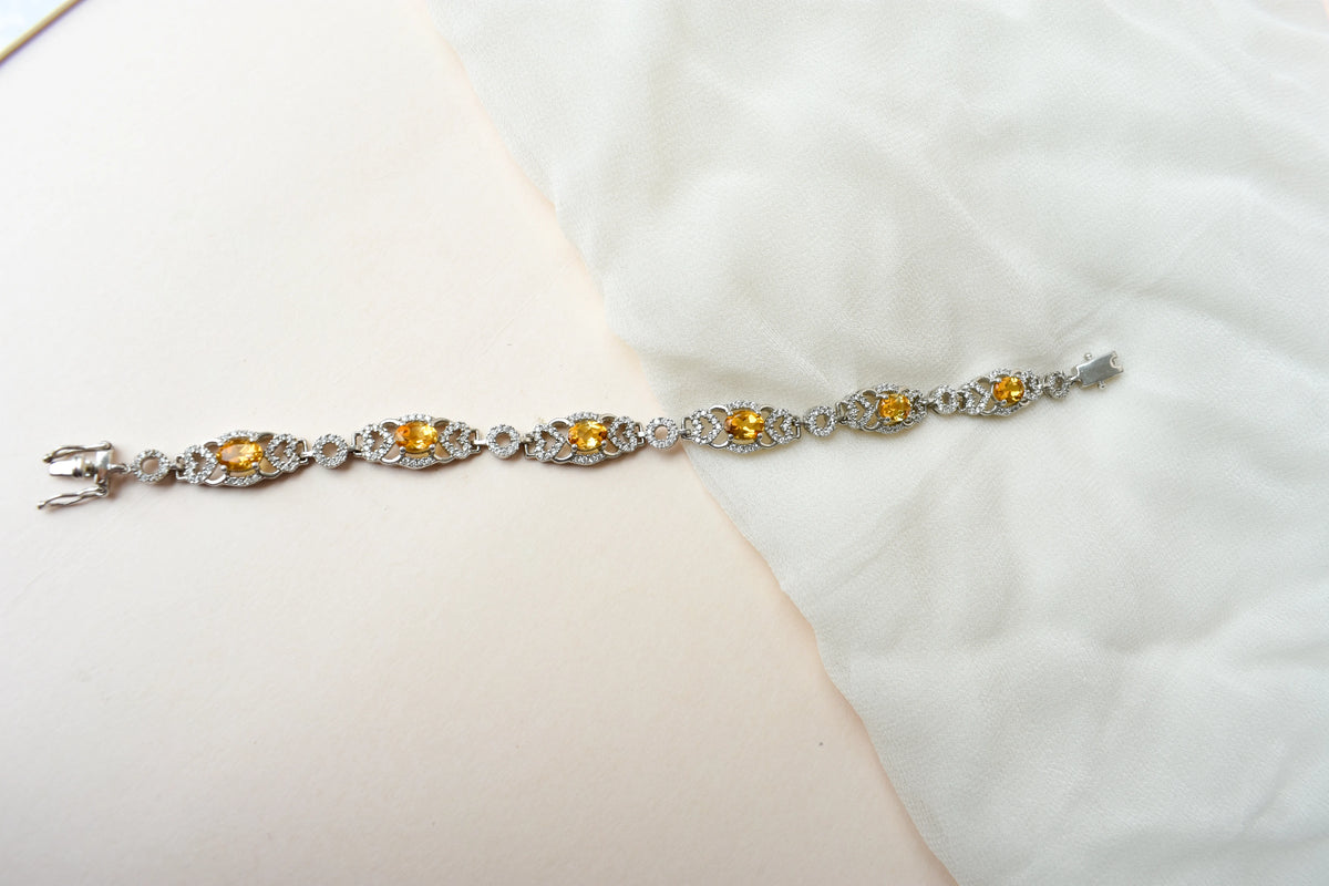 Citrine and cubic zirconia halo bracelet in 925 silver