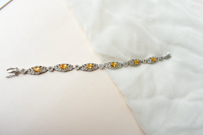 Citrine and cubic zirconia halo bracelet in 925 silver