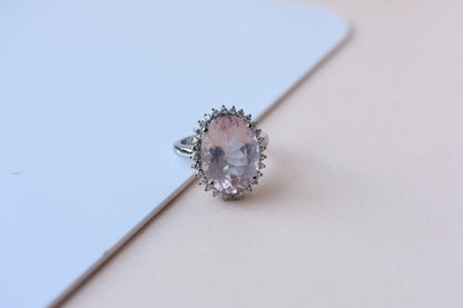 Oval rose quartz halo ring in 925 silver with cubic zirconia accents