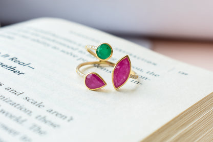 Emerald and ruby cluster ring in 18K gold with open split shank