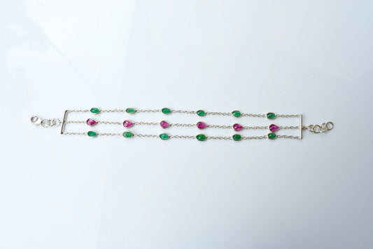 Multi gemstone three-strand bracelet in silver with pink and green stones
