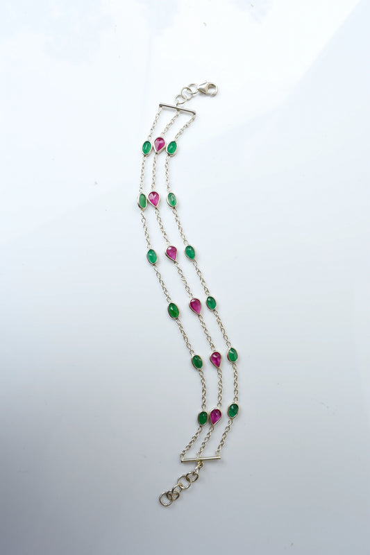 Multi gemstone three-strand bracelet in silver with pink and green stones