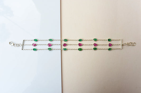 Multi gemstone three-strand bracelet in silver with pink and green stones