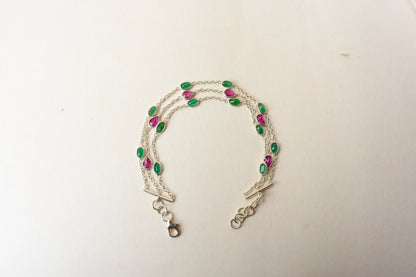 Multi gemstone three-strand bracelet in silver with pink and green stones