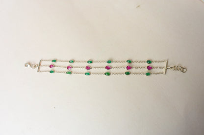 Multi gemstone three-strand bracelet in silver with pink and green stones