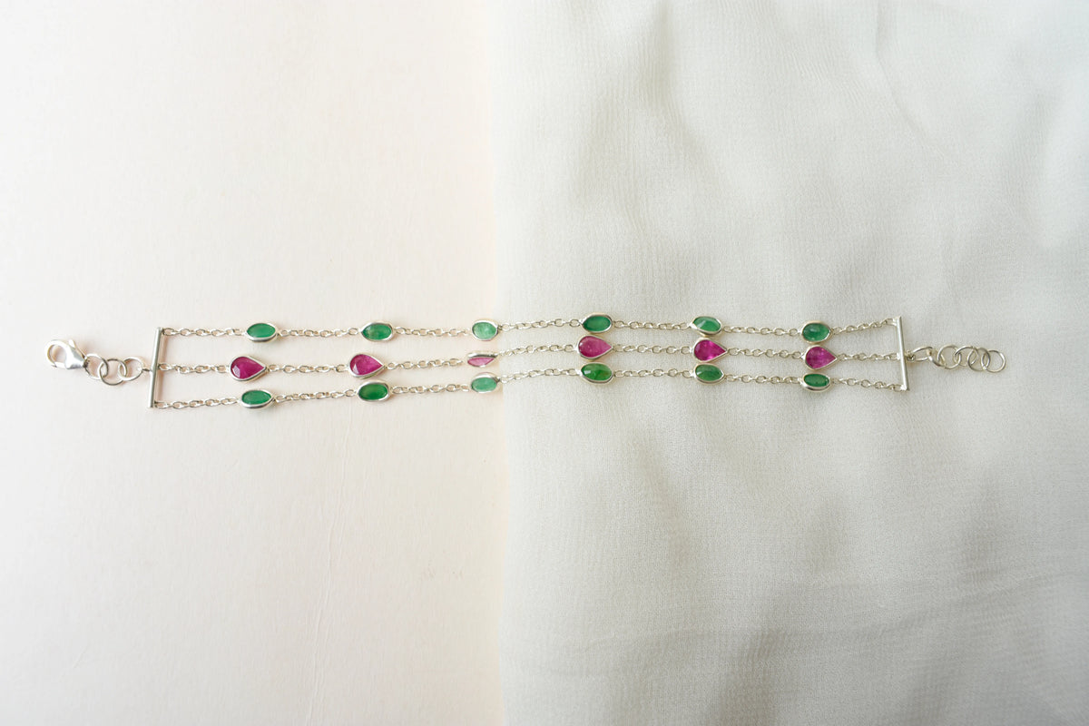 Multi gemstone three-strand bracelet in silver with pink and green stones