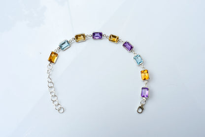 Citrine, amethyst, and blue topaz emerald-cut bracelet in 925 silver