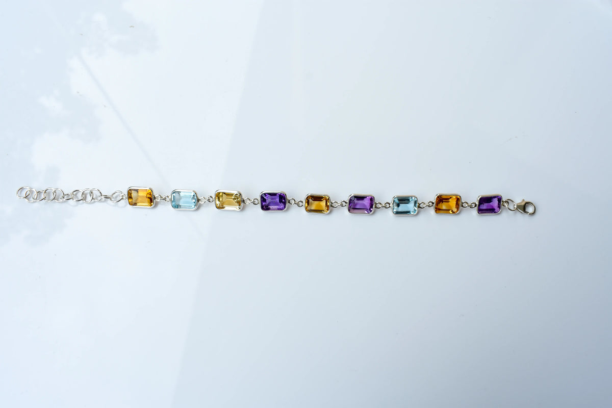 Citrine, amethyst, and blue topaz emerald-cut bracelet in 925 silver