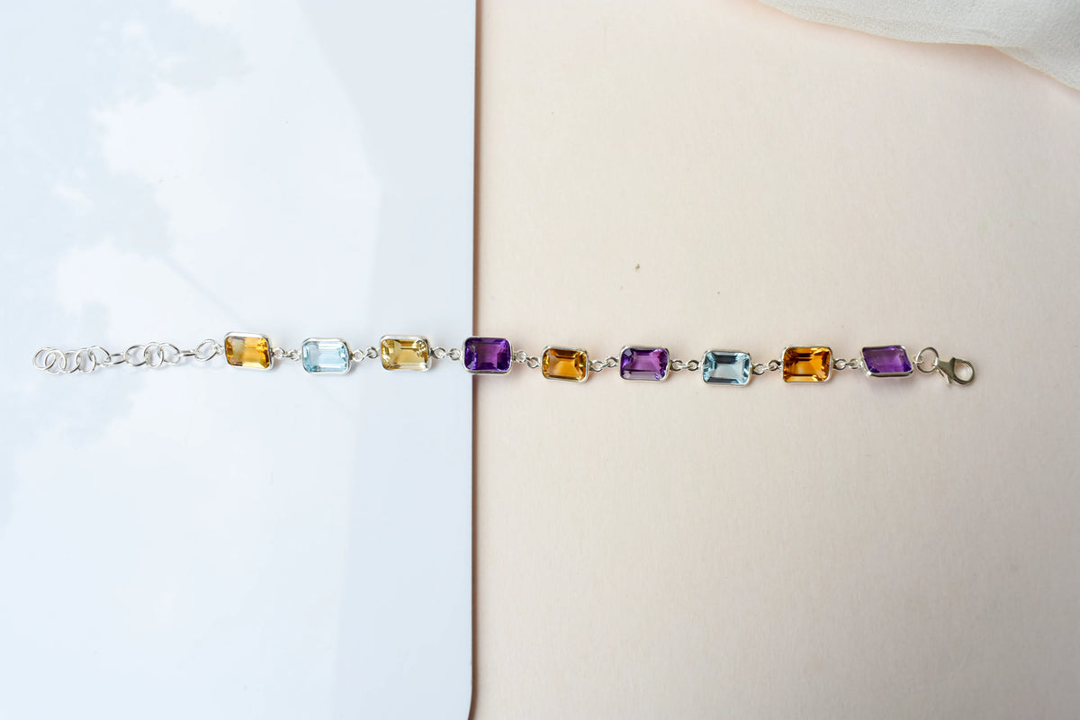 Citrine, amethyst, and blue topaz emerald-cut bracelet in 925 silver