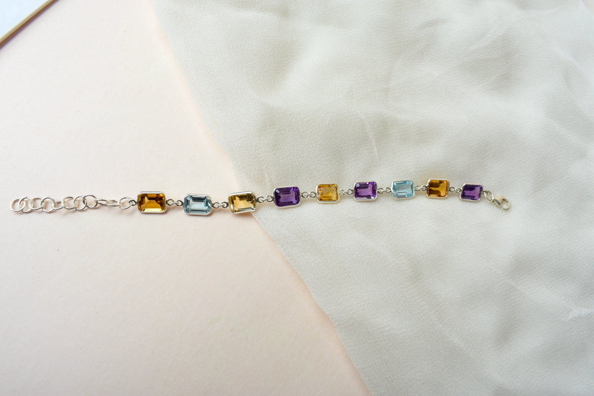 Citrine, amethyst, and blue topaz emerald-cut bracelet in 925 silver