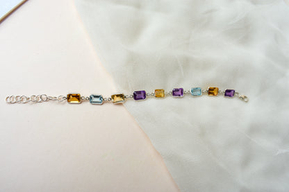 Citrine, amethyst, and blue topaz emerald-cut bracelet in 925 silver