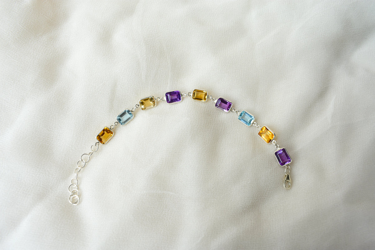 Citrine, amethyst, and blue topaz emerald-cut bracelet in 925 silver
