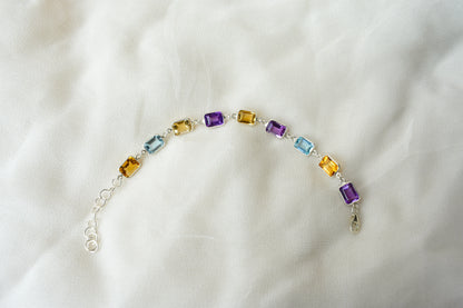 Citrine, amethyst, and blue topaz emerald-cut bracelet in 925 silver