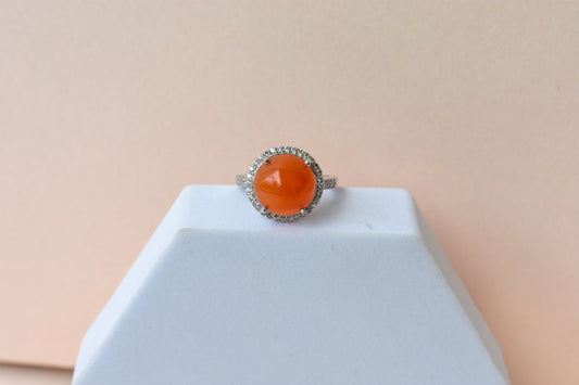 Round carnelian cabochon ring with cubic zirconia halo in 925 silver