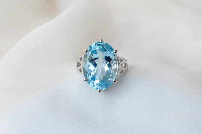 Oval sky blue topaz solitaire ring in 925 silver