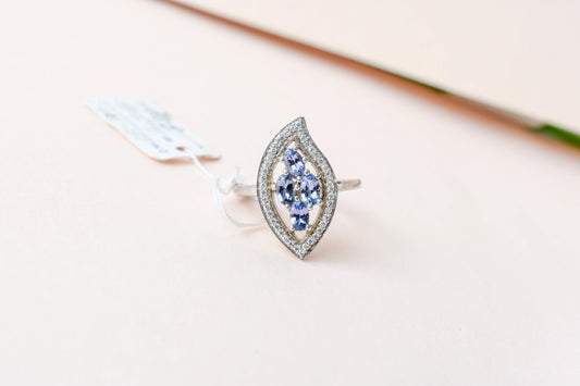Blue-violet gemstone cluster ring in marquise frame, 925 silver