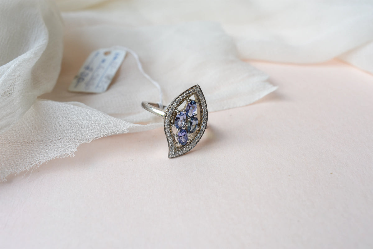 Blue-violet gemstone cluster ring in marquise frame, 925 silver