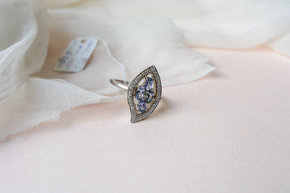 Blue-violet gemstone cluster ring in marquise frame, 925 silver