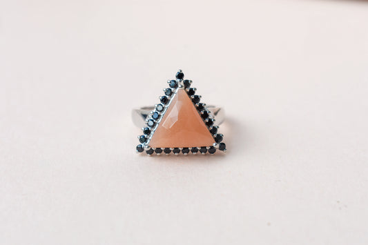 Triangular sunstone ring with black spinel halo in 925 silver