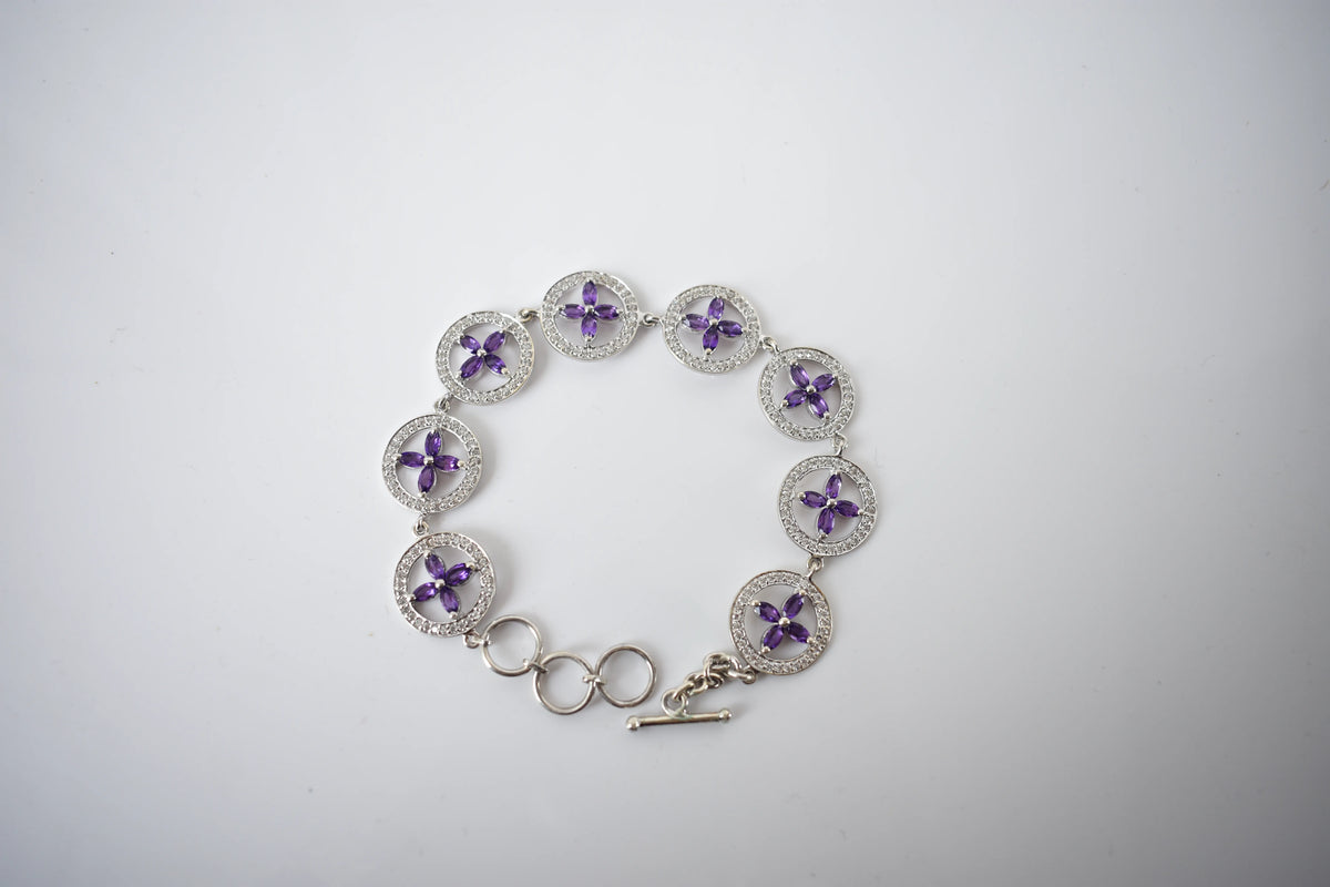 Amethyst flower halo bracelet with cubic zirconia pave links in 925 silver