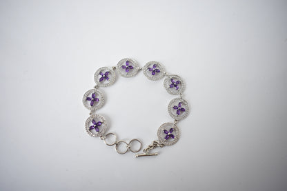 Amethyst flower halo bracelet with cubic zirconia pave links in 925 silver