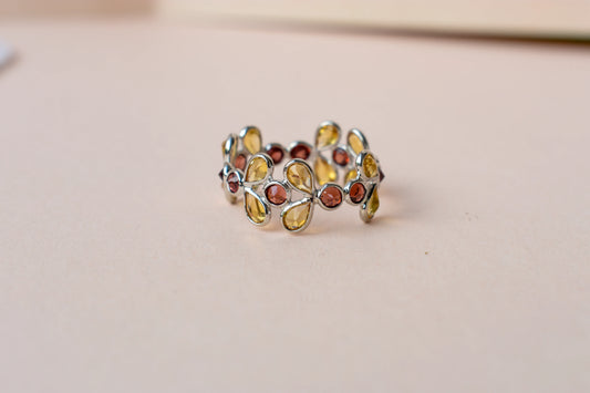 Citrine and garnet flower link eternity band in 925 silver