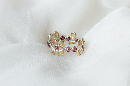 Citrine and garnet flower link eternity band in 925 silver