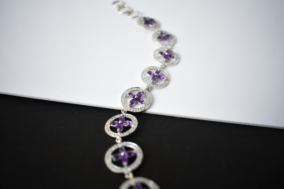 Amethyst flower halo bracelet with cubic zirconia pave links in 925 silver