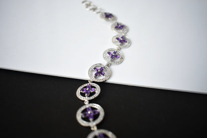 Amethyst flower halo bracelet with cubic zirconia pave links in 925 silver