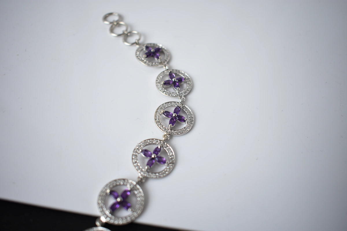 Amethyst flower halo bracelet with cubic zirconia pave links in 925 silver