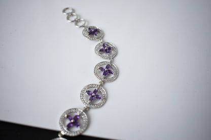 Amethyst flower halo bracelet with cubic zirconia pave links in 925 silver