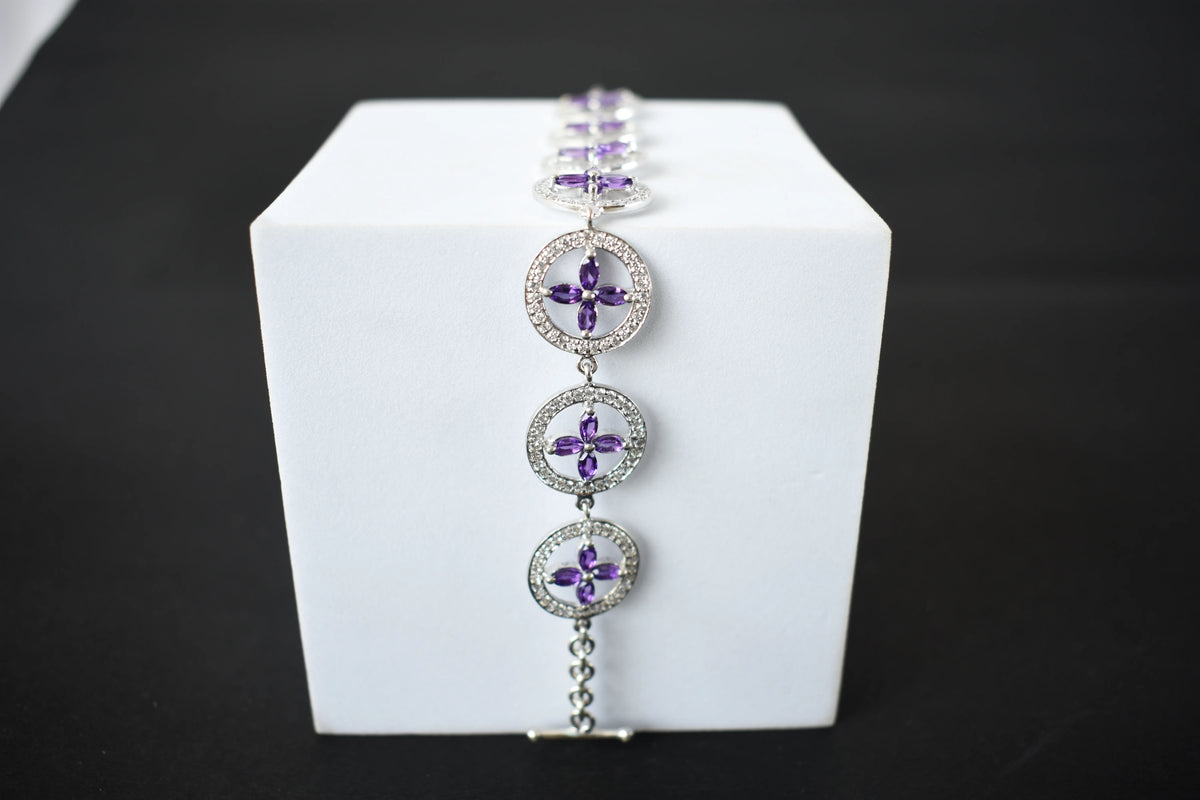 Amethyst flower halo bracelet with cubic zirconia pave links in 925 silver