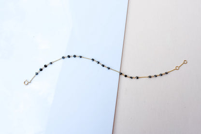 18K gold bracelet with clustered black diamond beads