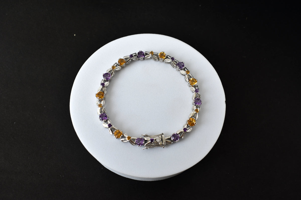 Amethyst and citrine tennis bracelet with alternating round stones in 925 silver