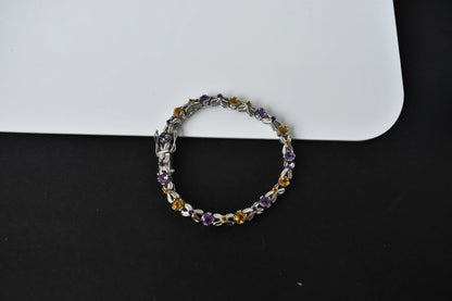 Amethyst and citrine tennis bracelet with alternating round stones in 925 silver